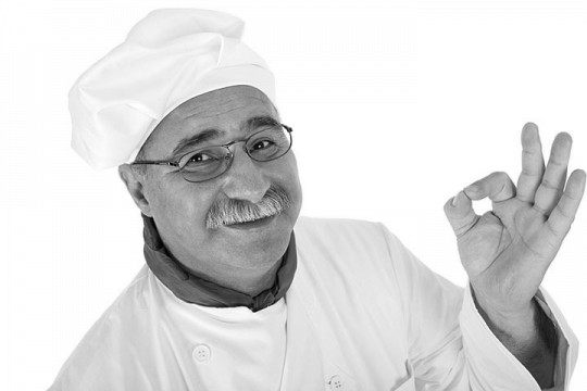 a smiling Italian chef